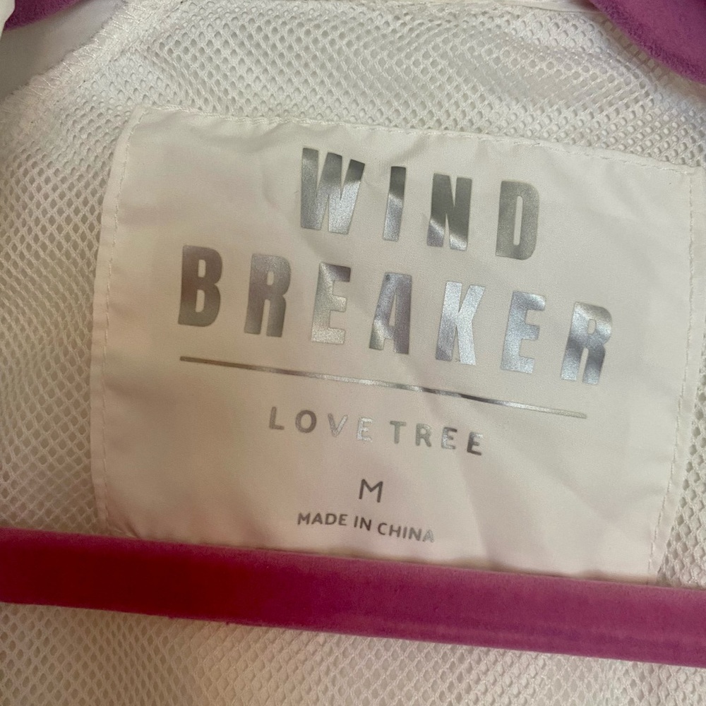 A Love Tree Junior wind breaker, white, size medium and crop style.